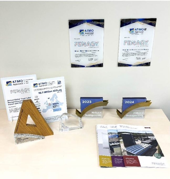 FENAGY office display with ATMO Approved certificates and 2023–2024 awards